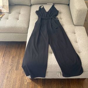 Black full length jumpsuit. NEW/NEVER WORN